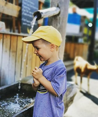 Kid playing in water